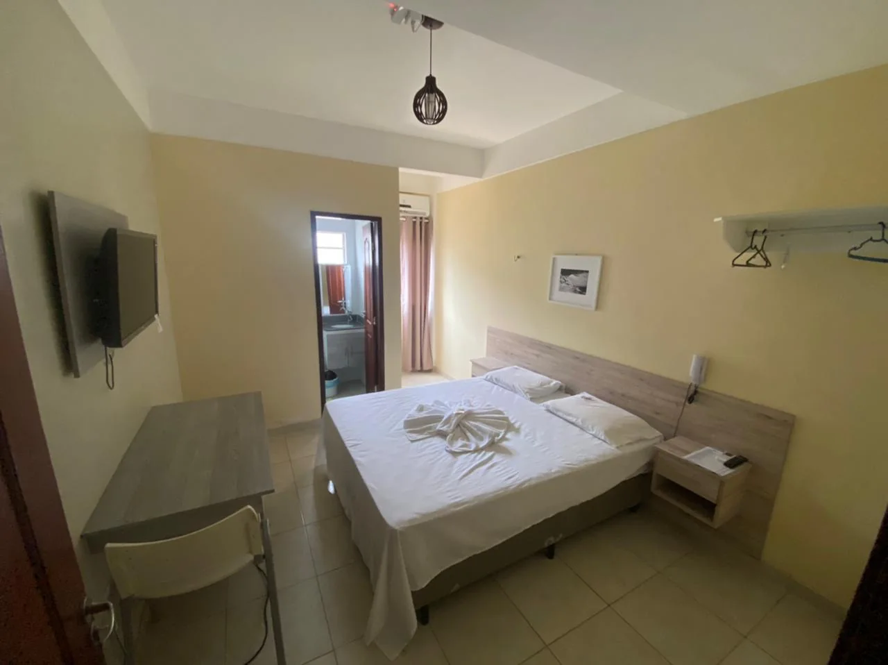 Quarto do Gran Parada Hotel com cama de casal